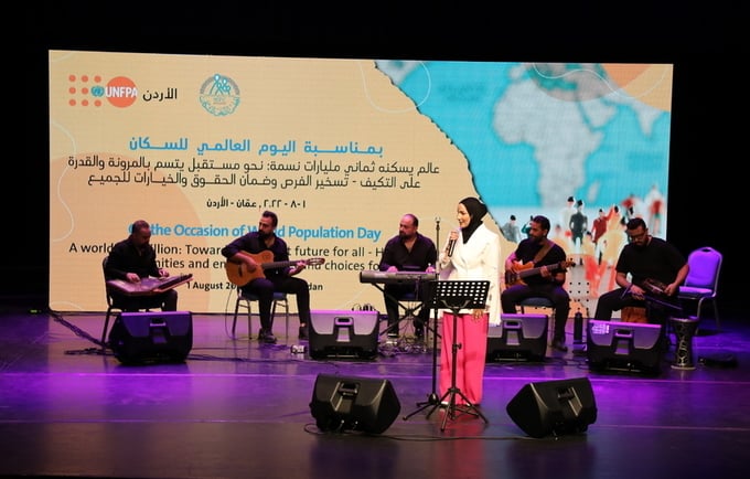 Nedaa Sharara performing at World Population Day event