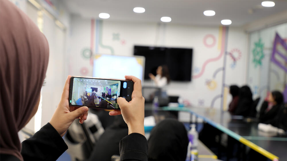 Participants of the “Me and My Mobile” program at the Zain Innovation Center (ZINC) in Mutah University, Karak, engage in an interactive workshop to enhance their digital skills